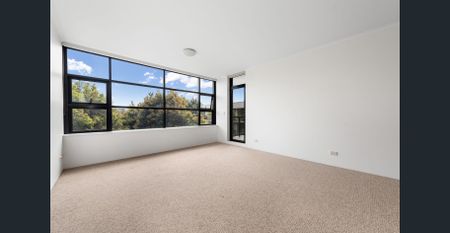 Sunlit luxury living with resort-style amenities in a prime location - Photo 2