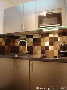 Logement à Paris, Location meublée - Photo 2