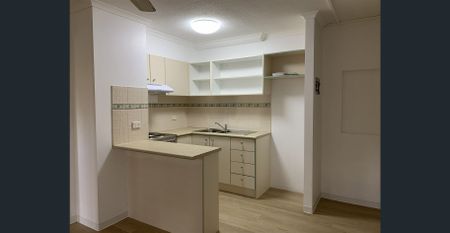 A Quiet Sanctuary Away from The Bustle of The Inner-City with New Flooring, New Paint and New Cooking Appliance. - Photo 3