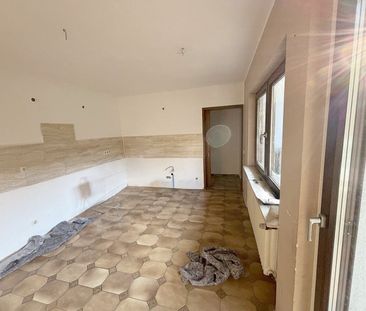Traumhaft gelegene 3-Zimmer-Wohnung in Zerf mit Balkon und Gartenmi... - Foto 1