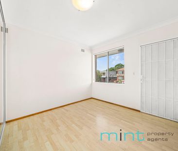 Freshly painted 2-bedroom unit available now - Photo 4