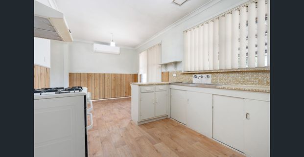 AFFORDABLE & CONVENIENTLY LOCATED - Photo 1