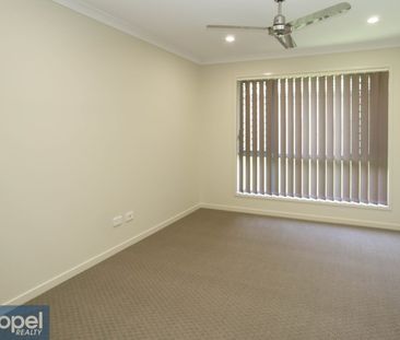 Modern 4 bedroom home in Riverbank estate - Photo 4