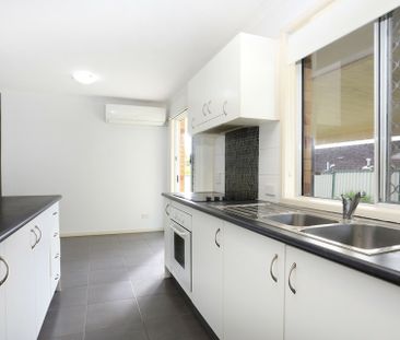 TIDY DUPLEX WITH POOL IN COMPLEX - Photo 1