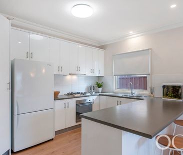 Open the Door To Stylish Living in the Heart of Kensington - Photo 2