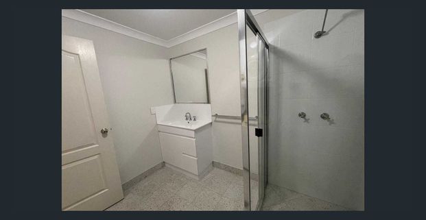 Comfortable Two-Bedroom Unit in Secure Complex - Photo 1