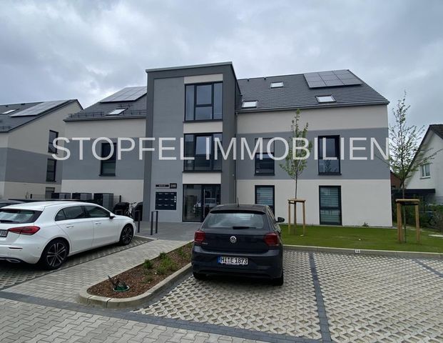 Moderne 4 ZKB im Erdgeschoss mit grosser Terrasse in unserer schönen Wohnanlage "GRÜNE MITTE" - Photo 1