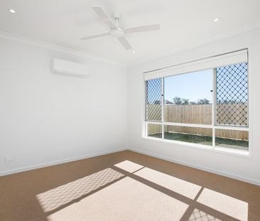 Spacious 4-Bedroom Home in the Heart of Redbank Plains! - Photo 3
