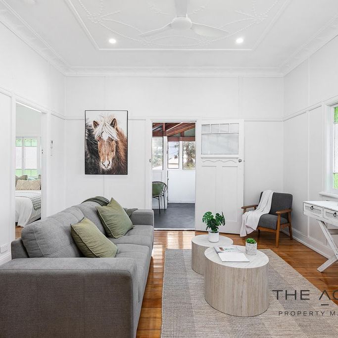 Comfortable 3-Bedroom Home in Convenient Berserker Location - Photo 1