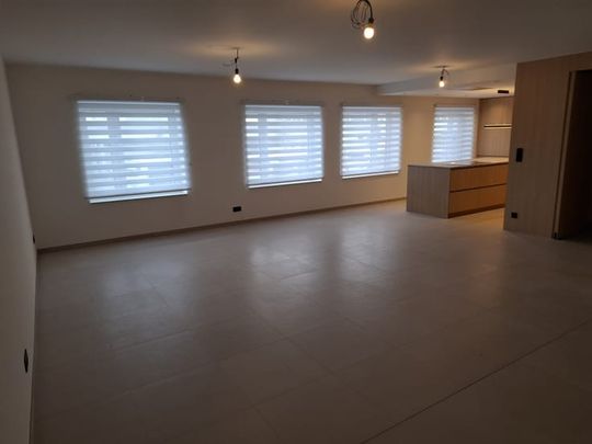 Appartement te huur - foto 1