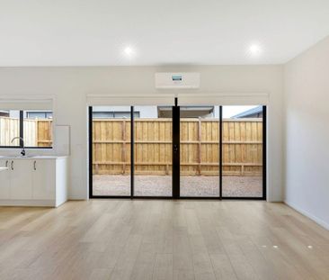 Beautifully Designed 4-Bedroom Family Home in Prime Location - Photo 2