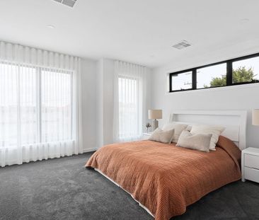 Brand New Modern 4-Bedroom Townhouse in McKinnon School Zone - Photo 2