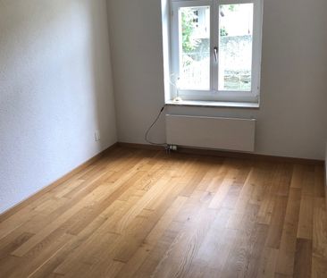 Zentrumsnahe Singlewohnung mit grossem Balkon! - Foto 1