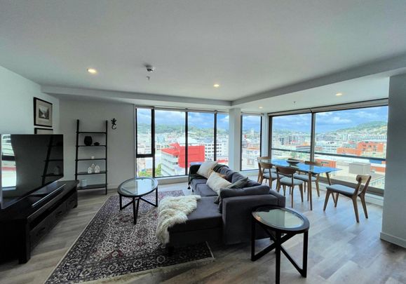 Open planned two bedroom city apartment - Photo 1