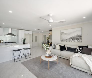 Stylish 4-Bedroom Family Home with Low-Maintenance Living - Photo 2