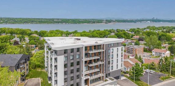 LE VUE - Appartement haut de gamme à St-Romuald - VUE majestueuse sur le fleuve...... - Photo 2