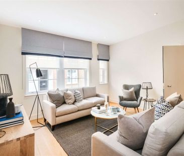 This spacious mews house situated within the gated development that... - Photo 4