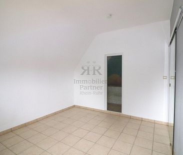 Schöne Dachgeschosswohnung im 2- Familienhaus! - Photo 1