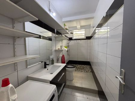 Location Appartement 3 pièces 64m² LES ABYMES 97139 - Photo 5