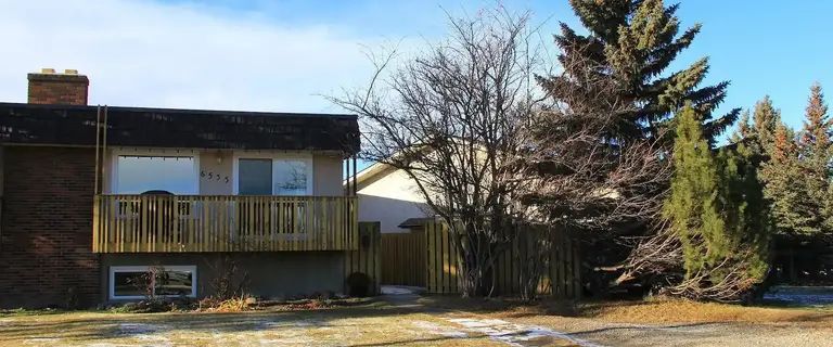 Bi-Level Duplex in West Dalhousie with 4 Bedrooms | 6535 58 Street Northwest, Calgary - Photo 1