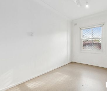 Comfortable 3-Bedroom Home with Spacious Yard in a Convenient Location - Photo 2