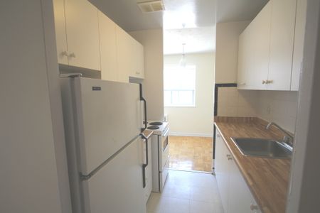 Lu Ray Apartments — 1 Bedroom - Photo 2
