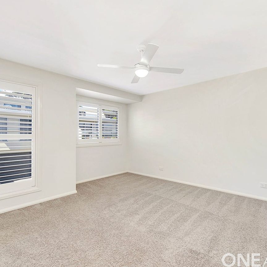 MINUTES AWAY FROM THE BEACH! - Photo 1