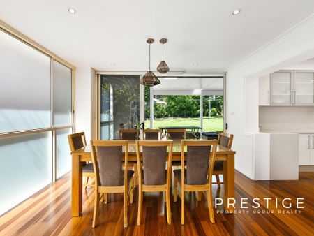 STUNNING FIVE-BEDROOM FAMILY HOME WITH VERSATILE SIXTH BEDROOM OPTION! - Photo 4