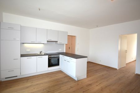 Gemütliche 2- Zimmer-Wohnung mit großer Loggia in den Innenhof - Foto 4