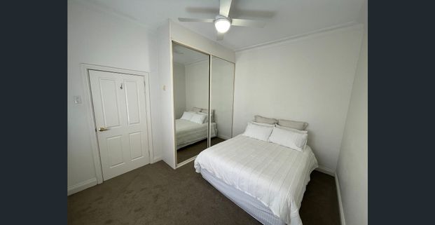 Stylishly Renovated Gem in a Prime Central Location - Photo 1