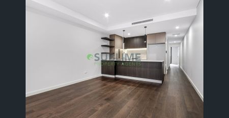 Split Level Modern 2 Bedroom Apartment with Parking and Storage Cage! - Photo 3