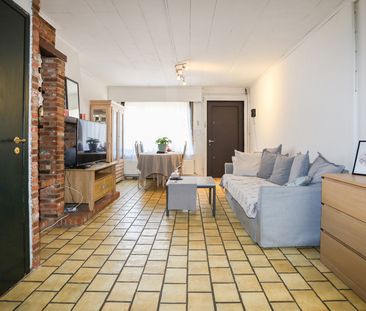 Leuke rijwoning met zij-ingang naar grote tuin - Photo 4