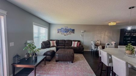 Stylish Auburn Bay Duplex With Garage & Newly Finished Basement - Photo 5