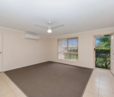 Spacious Family Home with Air-Conditioned Living & Large Backyard - Photo 2