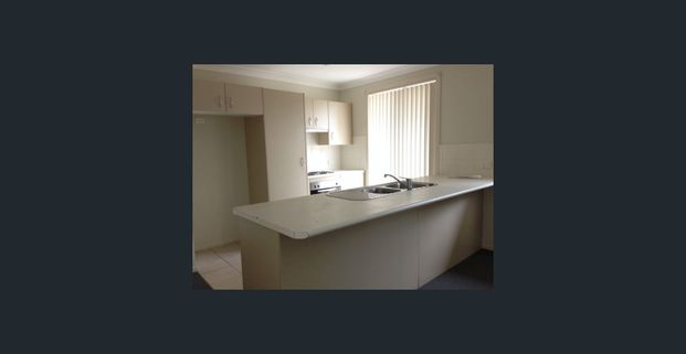 Modern and Low-Maintenance Living in a Convenient Location - Photo 1