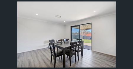 Spacious Family Home with Shed, Side Access & Multiple Living Zones - Photo 4