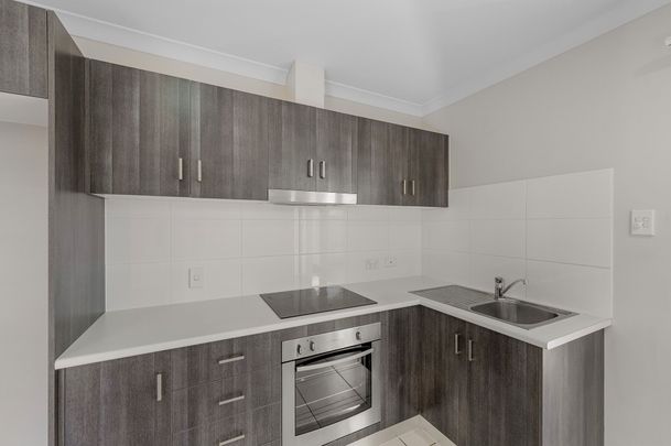 EASY LIVING ON HARMONY DRIVE - FRESH, BRIGHT, AND MOVE-IN READY AT A REDUCED PRICE! - Photo 1