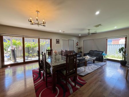 Spacious 4-Bedroom Home with Two Living Areas and Modern Upgrades - Photo 2