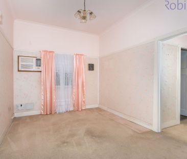 Three bedroom home with retro features. Pets considered! - Photo 3