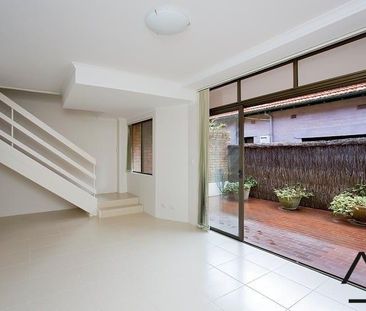 WELL MAINTAINED TWO STOREY TOWNHOUSE - - Photo 2