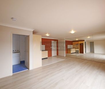 Large 1 Bedroom Unit with floorboard - Photo 6