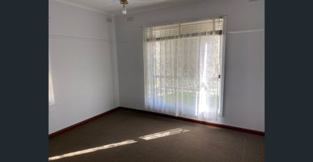 Simple Living with a Spacious Yard - Photo 2