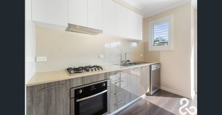 Stylish Two-Bedroom Townhouse in a Convenient Reservoir Location - Photo 3