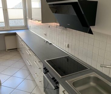 Traar! Moderne Wohnung mit Einbauküche, Sonnenbalkon und Garage im 1.OG! - Foto 6