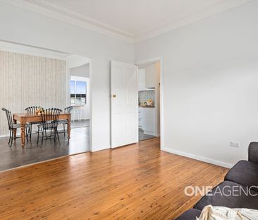 WARM AND WELCOMING FOUR-BEDROOM HOME - Photo 4