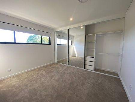 Modern Coastal Townhouse with Quality Finishes - Photo 2