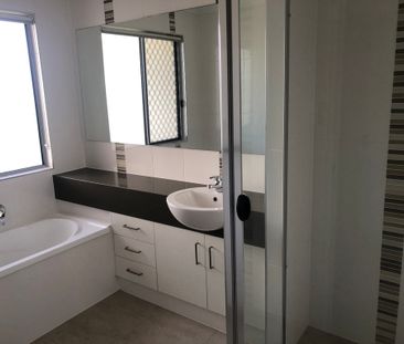 Fully fenced low maintenance yard - Photo 3