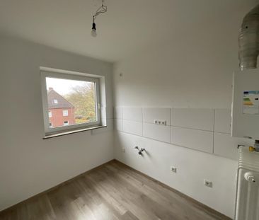 3-Zimmer-Wohnung im 2. Obergeschjoss mit Badewanne und Balkon in Wi... - Foto 4