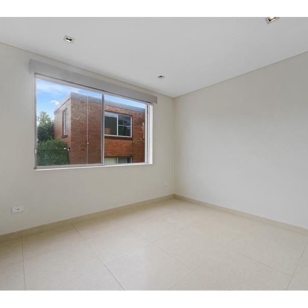 Contemporary One Bedroom Unit with Secure Parking - Photo 1