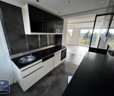 Appartement à louer 4 pièces 65.96m² - Photo 2